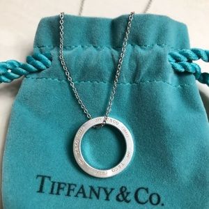 Tiffany and company circle pendant with 16” chain